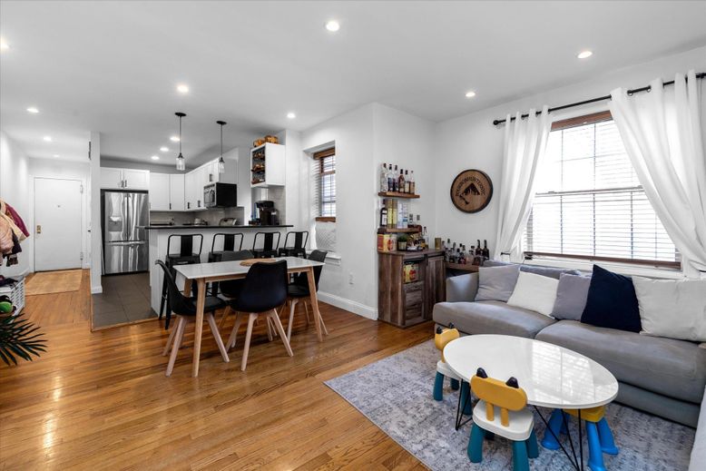 Dining room, Interior, Kitchen, Living room, Pendant Lights, Recessed Lighting, Stainless Steel Appliances, Wood Texture Flooring