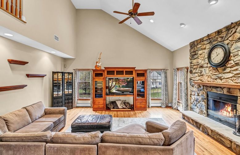Fireplace, Interior, Living room, Recessed Lighting, Stone Walls, Wood Texture Flooring