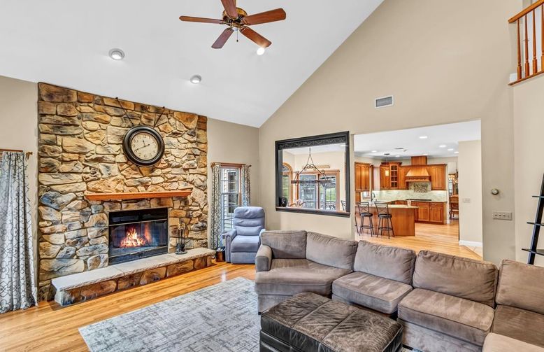 Fireplace, Interior, Kitchen, Living room, Recessed Lighting, Stone Walls, Wood Texture Flooring