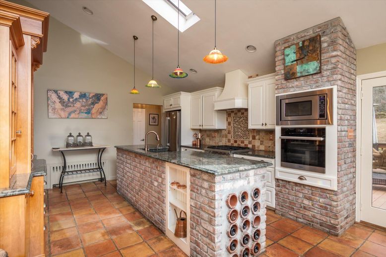 Interior, Kitchen, Pendant Lights, Recessed Lighting, Stainless Steel Appliances, Stone Walls