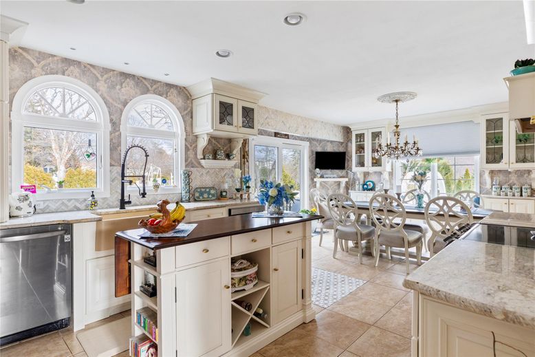 Chandelier, Dining room, Fireplace, Interior, Kitchen, Recessed Lighting, Stainless Steel Appliances