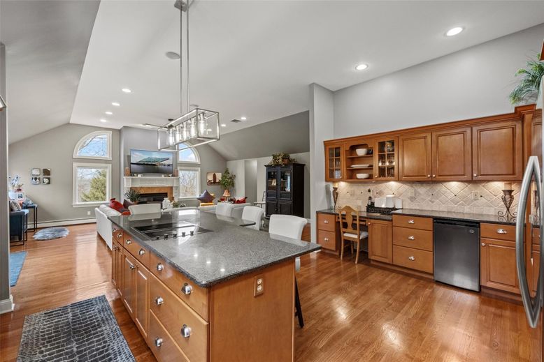 Fireplace, Interior, Kitchen, Living room, Pendant Lights, Recessed Lighting, Stainless Steel Appliances, Wood Texture Flooring