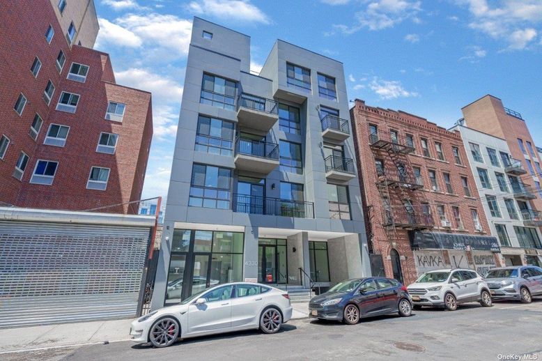Exterior, Facade, Brick Facade, Condo Building