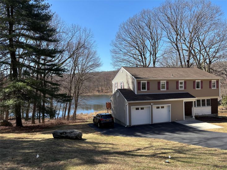 Attached, Exterior, Facade, Water, Raised Ranch