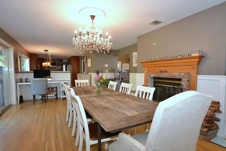 Chandelier, Dining room, Fireplace, Interior, Kitchen, Pendant Lights, Wood Texture Flooring