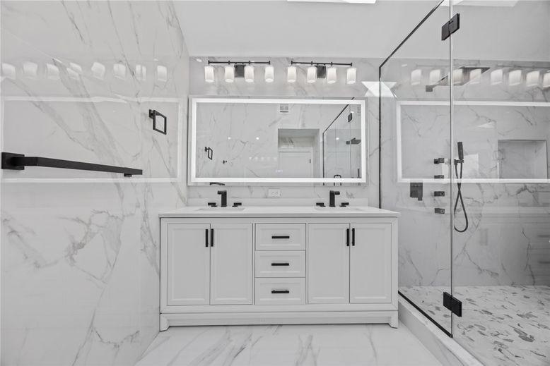 Bathroom, Dual Sink Vanities, Glass Shower, Interior, Marble, Marble Walls