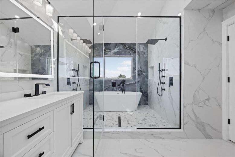 Bathroom, Free Standing Baths, Glass Shower, Interior, Marble, Marble Walls, Recessed Lighting