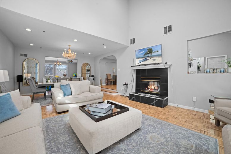Chandelier, Dining room, Fireplace, Interior, Living room, Recessed Lighting, Wood Texture Flooring