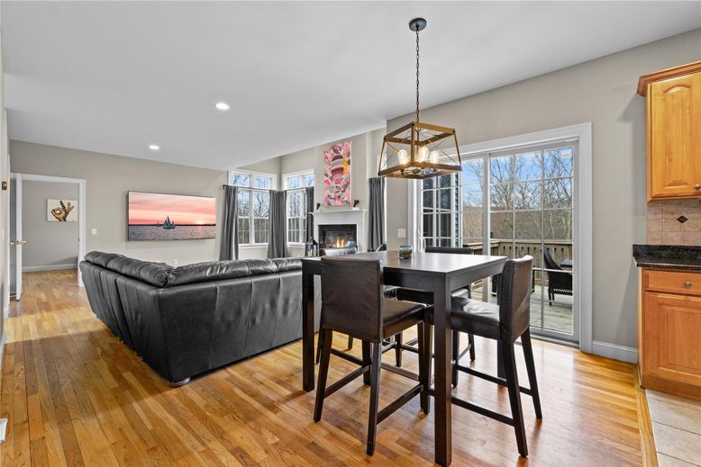 Dining room, Fireplace, Interior, Living room, Pendant Lights, Recessed Lighting, Wood Texture Flooring