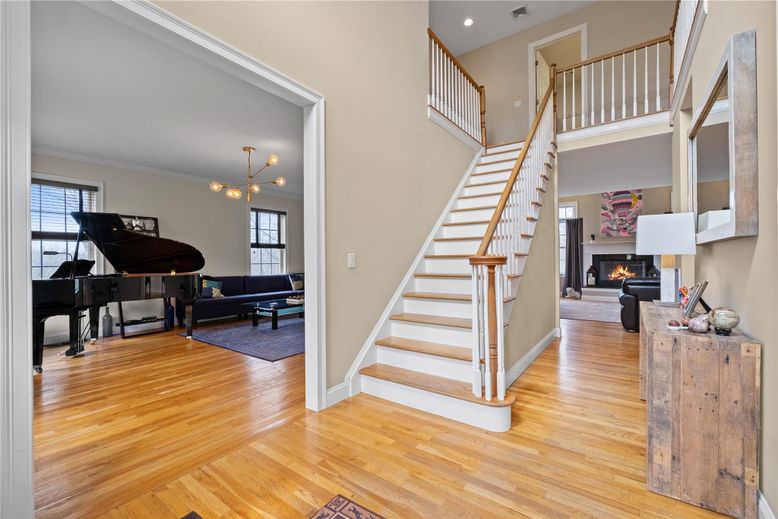 Fireplace, Interior, Living room, Pendant Lights, Piano, Recessed Lighting, Wood Texture Flooring