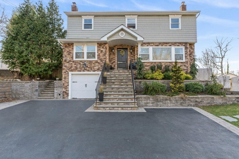 Attached, Exterior, Facade, Brick Facade, Raised Ranch