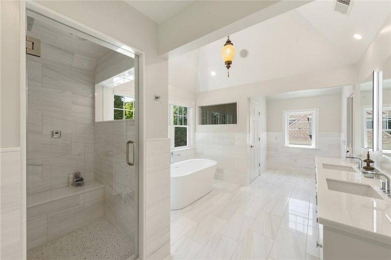 Bathroom, Dual Sink Vanities, Free Standing Baths, Glass Shower, Interior, Marble Walls, Recessed Lighting