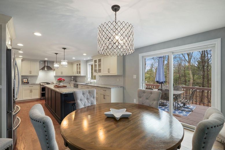 Chandelier, Dining room, Interior, Kitchen, Pendant Lights, Recessed Lighting, Stainless Steel Appliances, Wood Texture Flooring