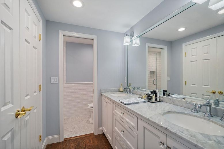 Bathroom, Dual Sink Vanities, Interior, Recessed Lighting, Wood Texture Flooring