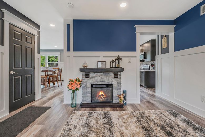 Dining room, Fireplace, Interior, Kitchen, Recessed Lighting, Wood Texture Flooring