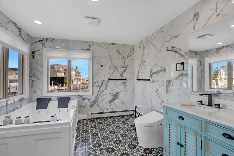 Bathroom, Dual Sink Vanities, Interior, Marble Walls, Recessed Lighting