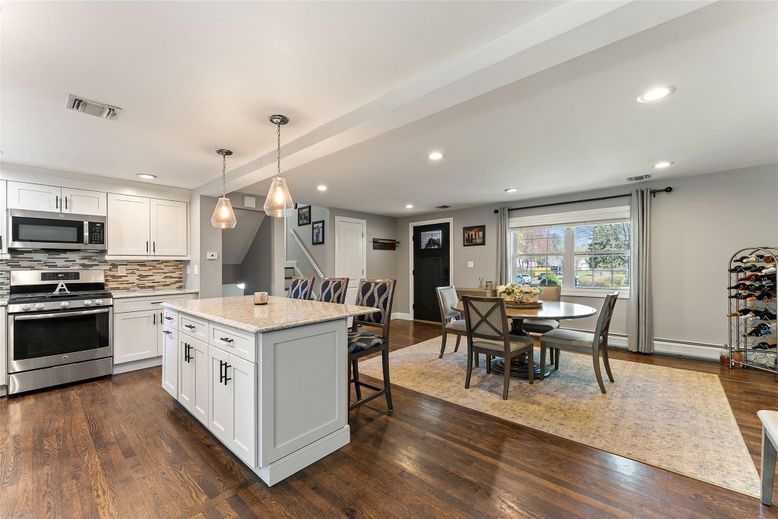 Dining room, Interior, Kitchen, Pendant Lights, Recessed Lighting, Stainless Steel Appliances, Wood Texture Flooring