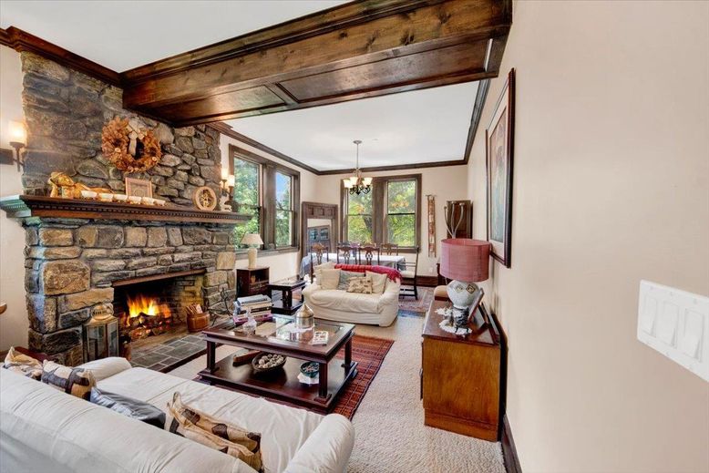 Chandelier, Dining room, Fireplace, Interior, Living room, Pendant Lights, Stone Walls