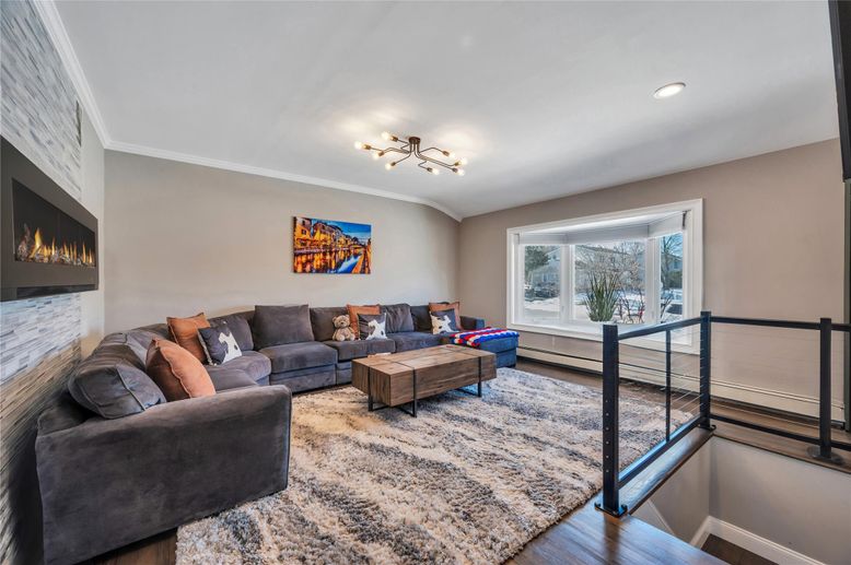 Fireplace, Interior, Living room, Recessed Lighting, Wood Texture Flooring
