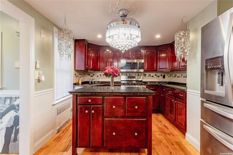 Chandelier, Interior, Kitchen, Pendant Lights, Recessed Lighting, Stainless Steel Appliances, Wood Texture Flooring