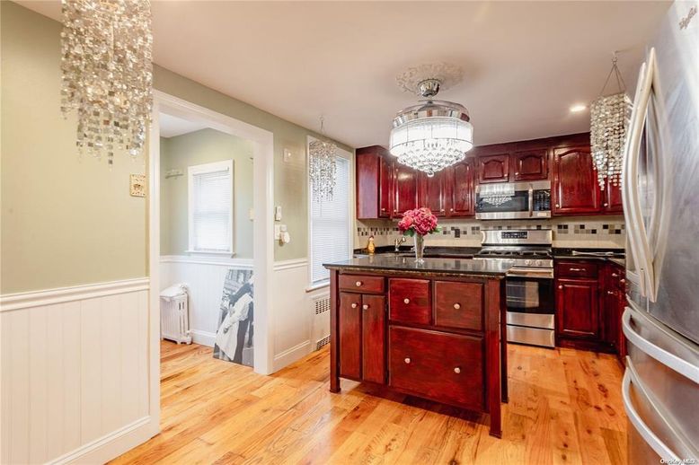 Chandelier, Interior, Kitchen, Recessed Lighting, Stainless Steel Appliances, Wood Texture Flooring
