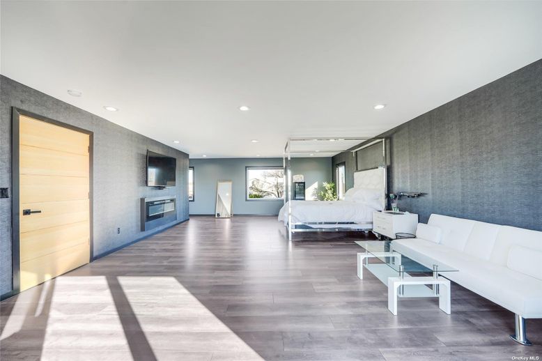 Bedroom, Fireplace, Interior, Living room, Recessed Lighting, Wood Texture Flooring