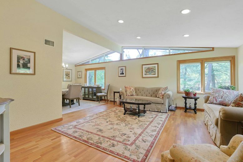 Dining room, Fireplace, Interior, Living room, Recessed Lighting, Wood Texture Flooring