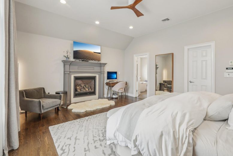 Bedroom, Fireplace, Interior, Recessed Lighting, Wood Texture Flooring
