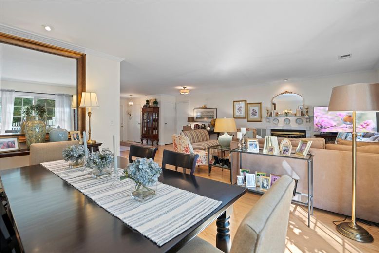 Dining room, Fireplace, Interior, Living room, Recessed Lighting, Wood Texture Flooring