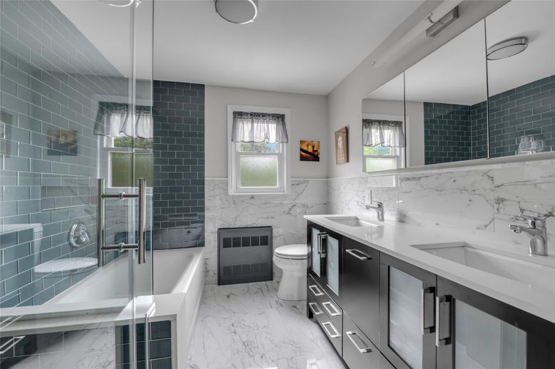 Bathroom, Dual Sink Vanities, Glass Shower, Interior, Marble, Marble Walls