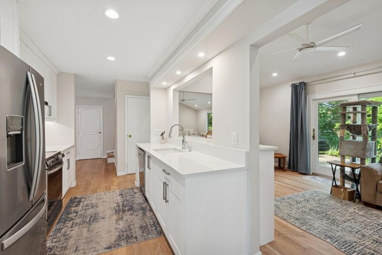 Interior, Kitchen, Recessed Lighting, Stainless Steel Appliances, Wood Texture Flooring