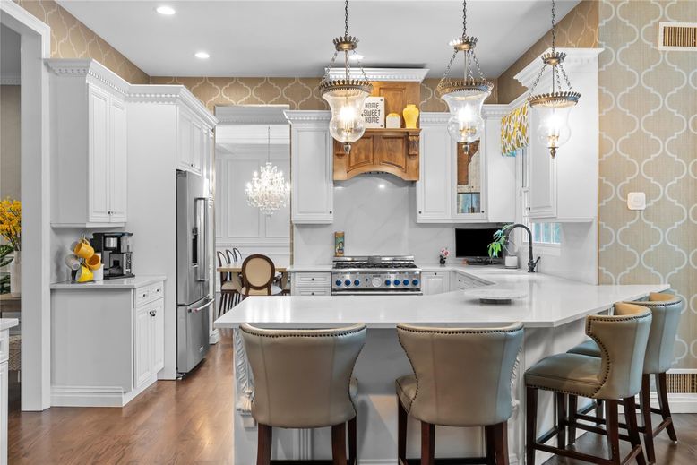 Chandelier, Interior, Kitchen, Pendant Lights, Recessed Lighting, Stainless Steel Appliances, Wood Texture Flooring