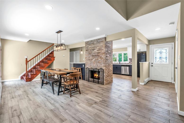 Dining room, Fireplace, Interior, Kitchen, Pendant Lights, Recessed Lighting, Stone Walls, Wood Texture Flooring