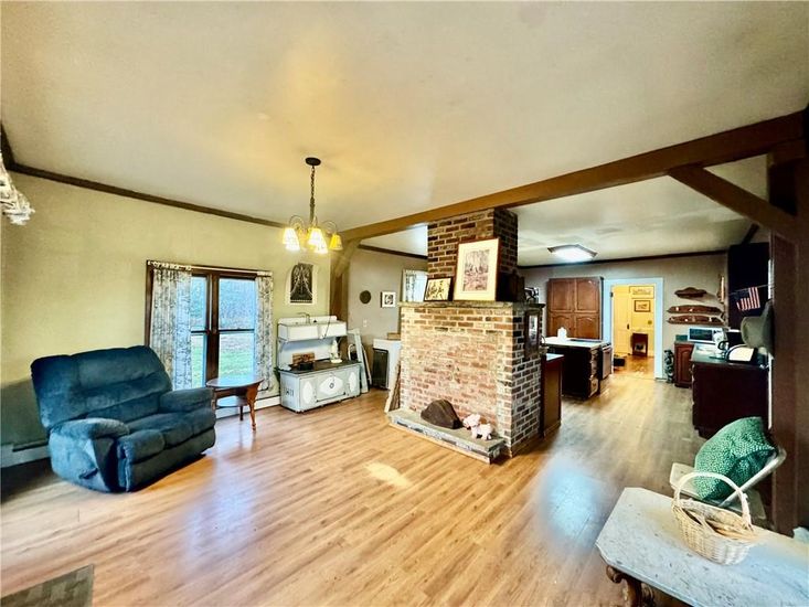 Fireplace, Interior, Pendant Lights, Stone Walls, Wood Texture Flooring
