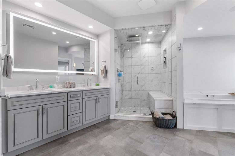 Bathroom, Dual Sink Vanities, Glass Shower, Interior, Marble Walls, Recessed Lighting