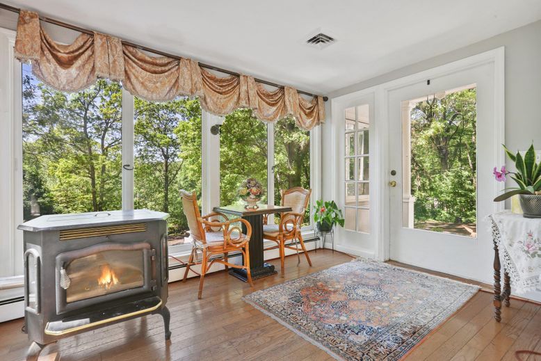 Dining room, Fireplace, Interior, Sun Room, Wood Texture Flooring