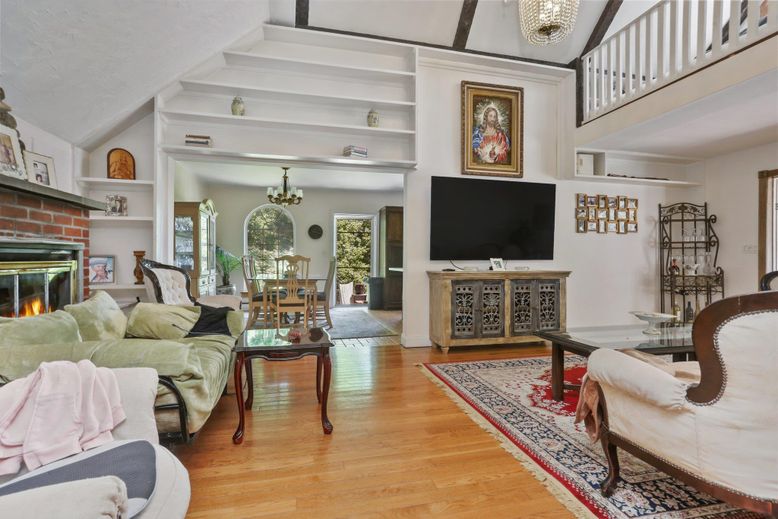 Chandelier, Dining room, Fireplace, Interior, Living room, Wood Texture Flooring
