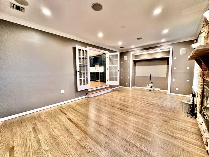 Empty room, Fireplace, Interior, Recessed Lighting, Wood Texture Flooring