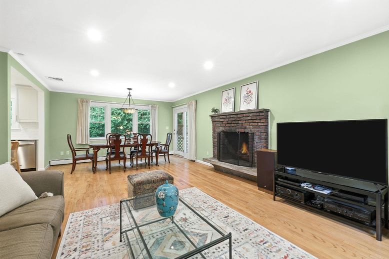 Dining room, Fireplace, Interior, Living room, Pendant Lights, Recessed Lighting, Wood Texture Flooring