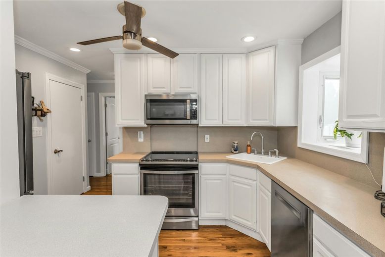 Interior, Kitchen, Recessed Lighting, Stainless Steel Appliances, Wood Texture Flooring