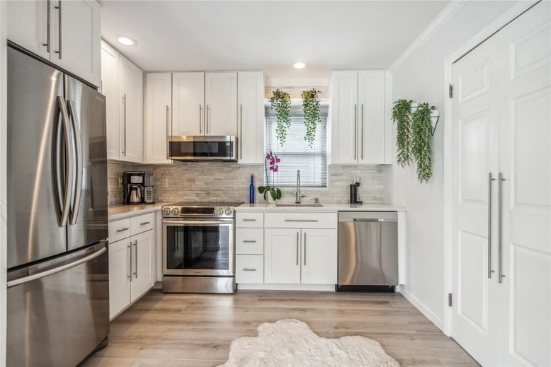 Interior, Kitchen, Recessed Lighting, Stainless Steel Appliances, Wood Texture Flooring