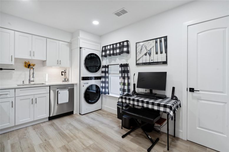 Interior, Kitchen, Recessed Lighting, Washer, Wood Texture Flooring