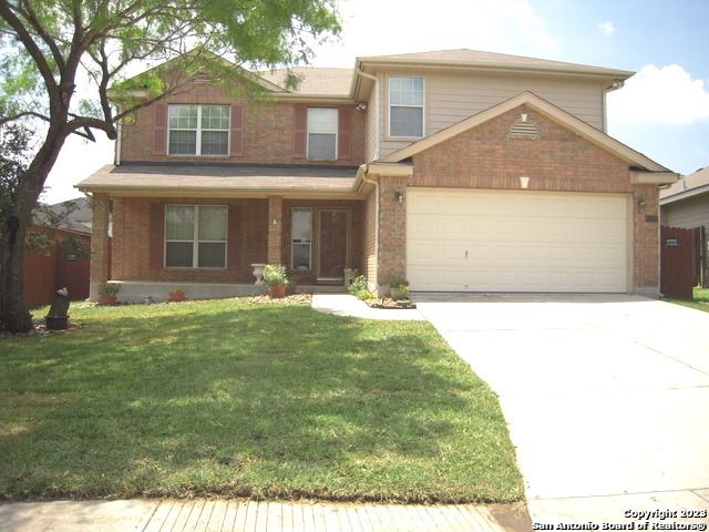 Attached, Exterior, Facade, Brick Facade, American Craftsman