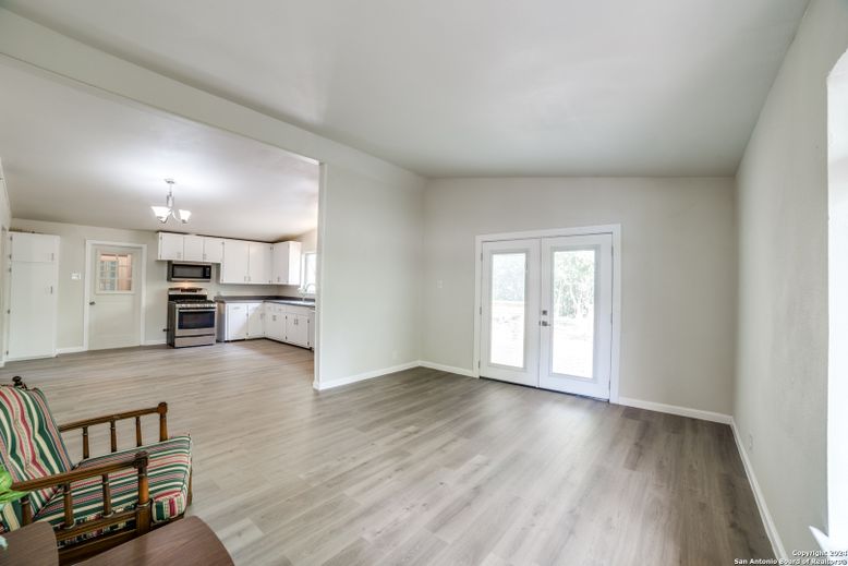 Chandelier, Empty room, Interior, Kitchen, Stainless Steel Appliances, Wood Texture Flooring