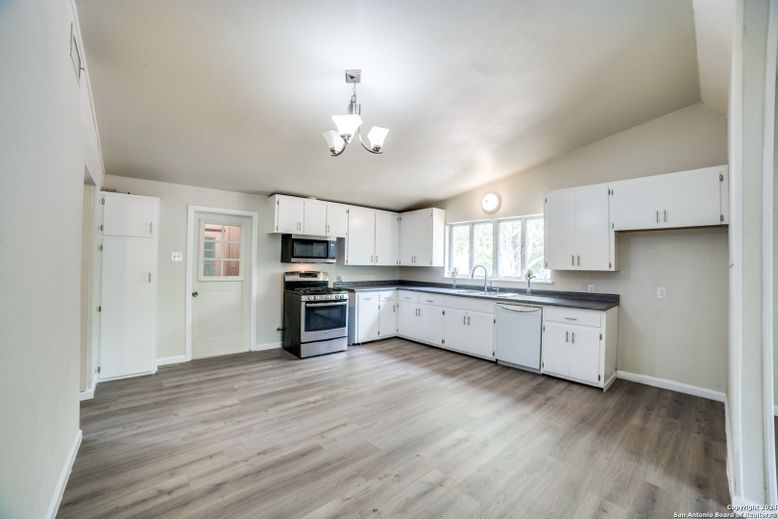 Chandelier, Interior, Kitchen, Pendant Lights, Stainless Steel Appliances, Wood Texture Flooring
