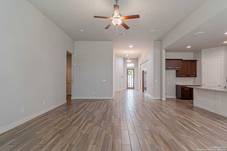 Empty room, Interior, Kitchen, Pendant Lights, Recessed Lighting, Wood Texture Flooring