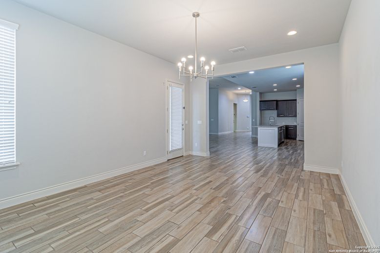 Empty room, Interior, Kitchen, Pendant Lights, Recessed Lighting, Wood Texture Flooring