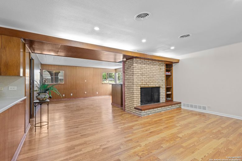 Empty room, Fireplace, Interior, Recessed Lighting, Stone Walls, Wood Texture Flooring, Wooden Walls