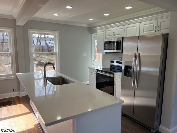 Interior, Kitchen, Recessed Lighting, Stainless Steel Appliances, Wood Texture Flooring
