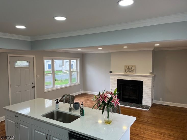 Fireplace, Interior, Kitchen, Recessed Lighting, Wood Texture Flooring